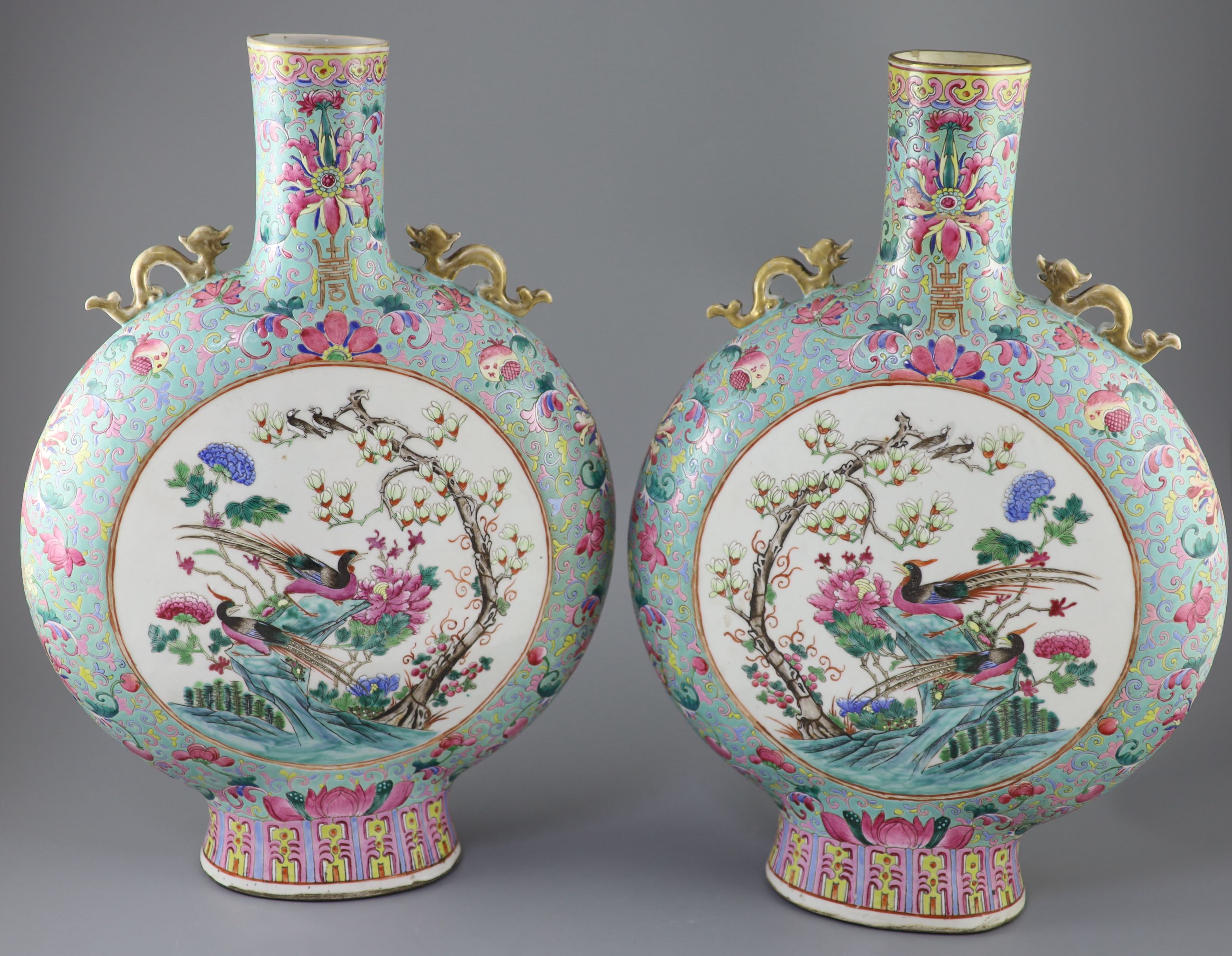 A pair of large Chinese turquoise ground famille rose moon flasks, Tongzhi seal mark and of the period (1862-74), 51cm high, Provenance